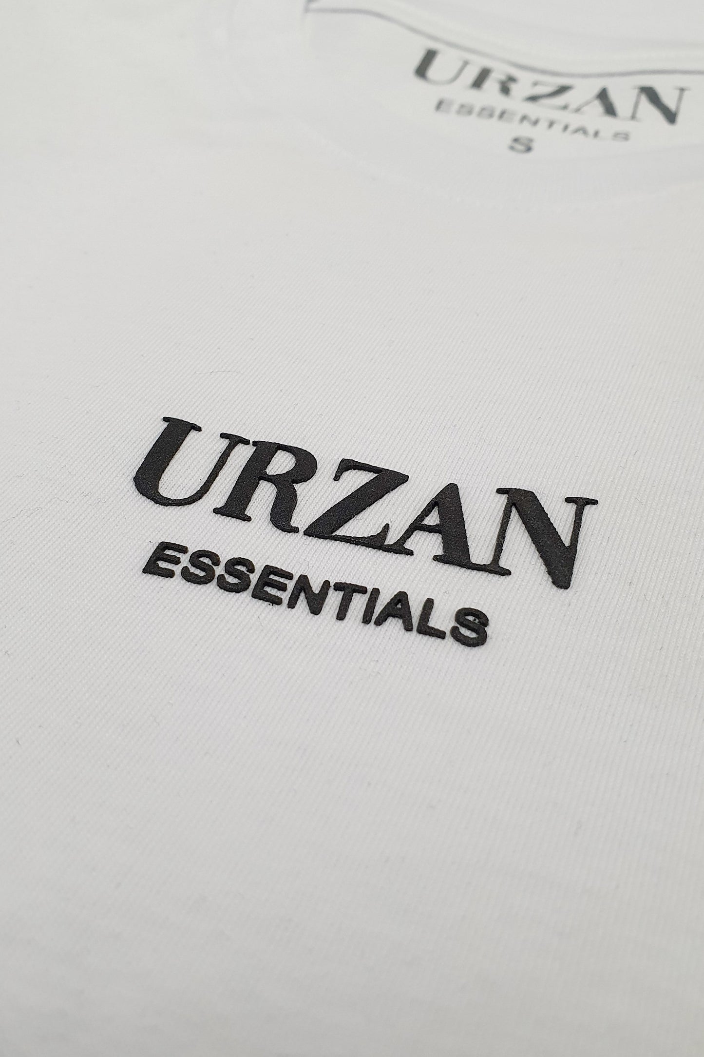 POLERA URZAN ESSENTIALS BLANCA